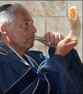 Right face Rabbi blowing shofar