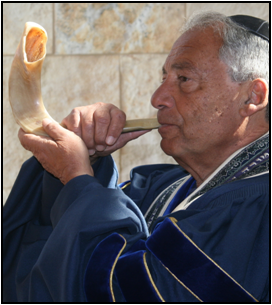 Rabbi blowing shofar
